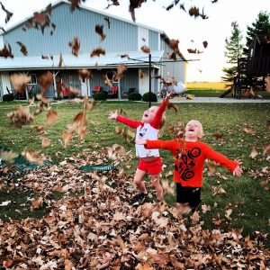 Fortman’s grandkids play happily in the leaves.
