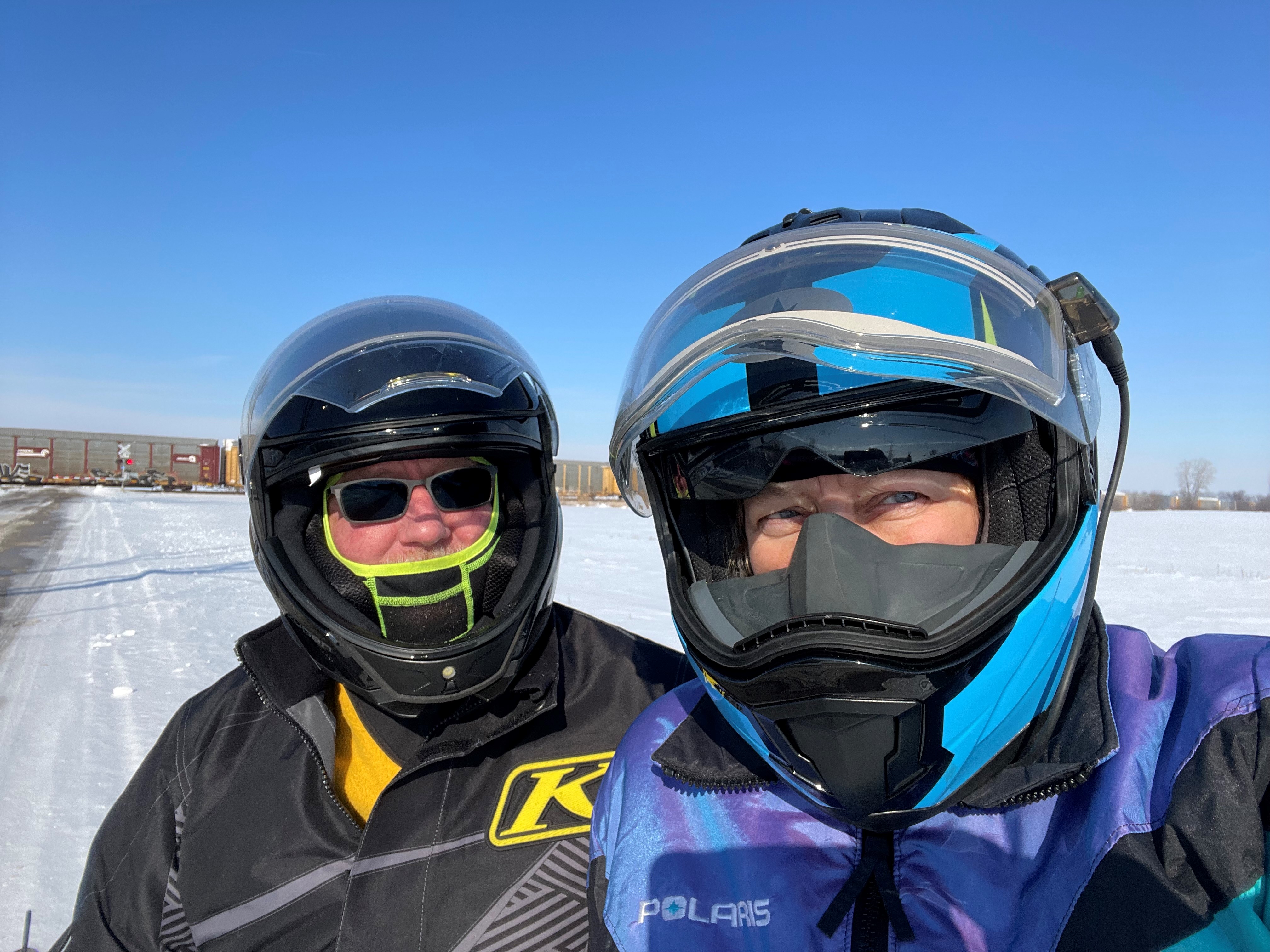 Tim and wife snowmobiling