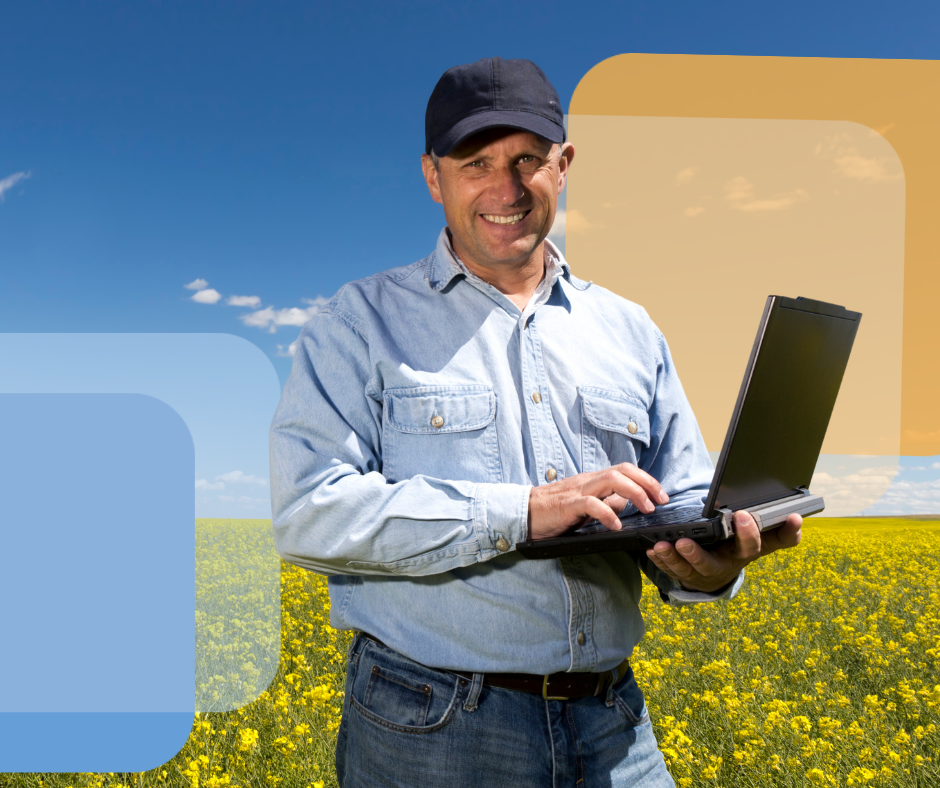 Farmer in a Field on a laptop