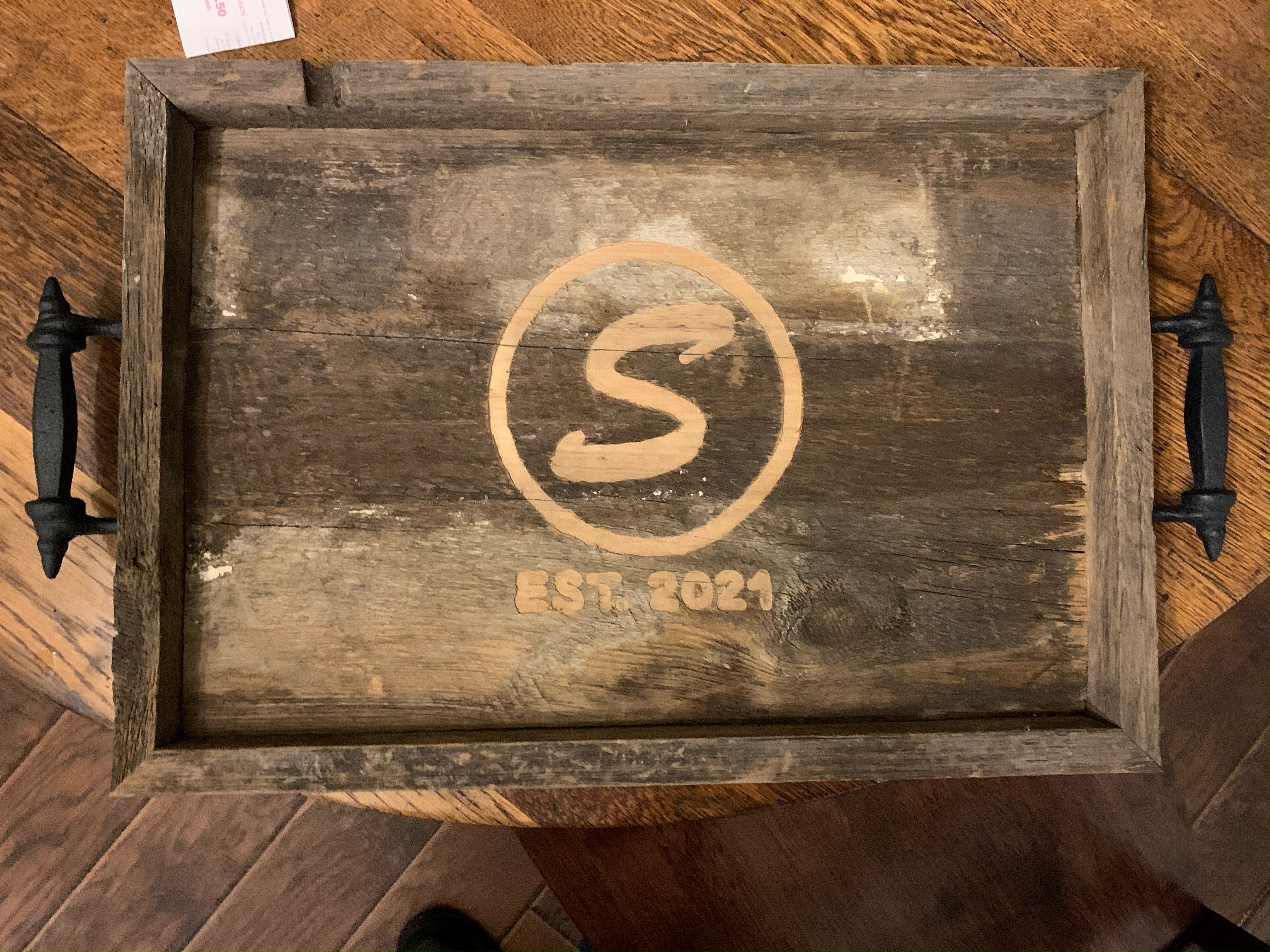 A serving tray Brad made from 150-year-old barn wood.