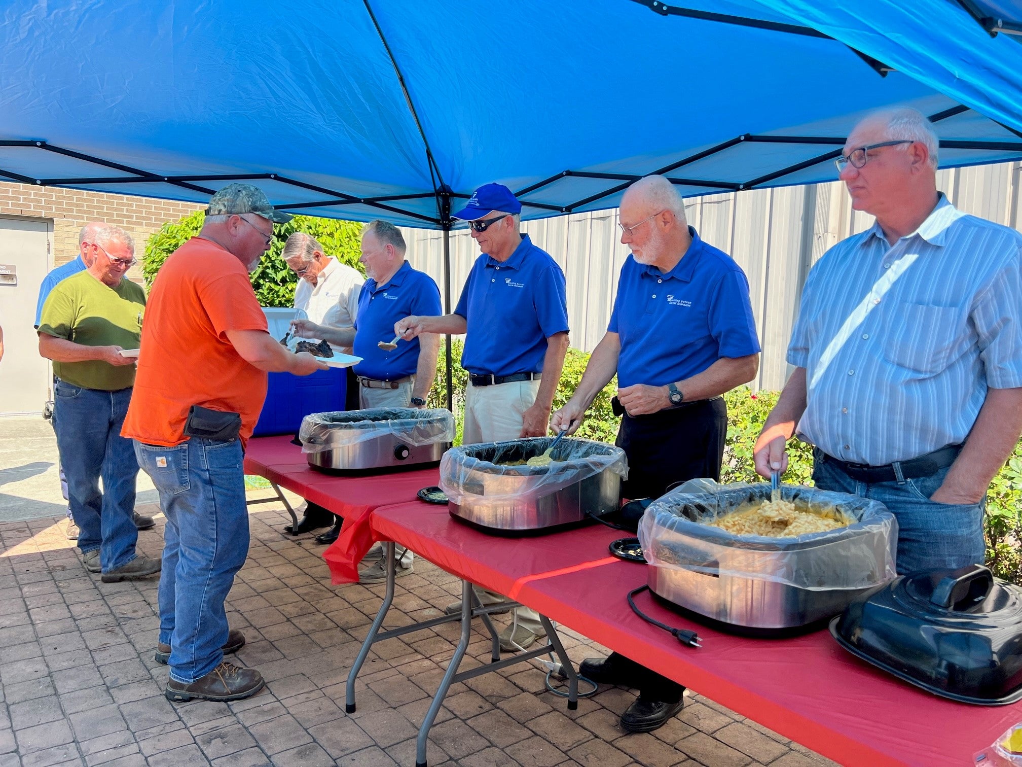 Dr. Black serving lunch