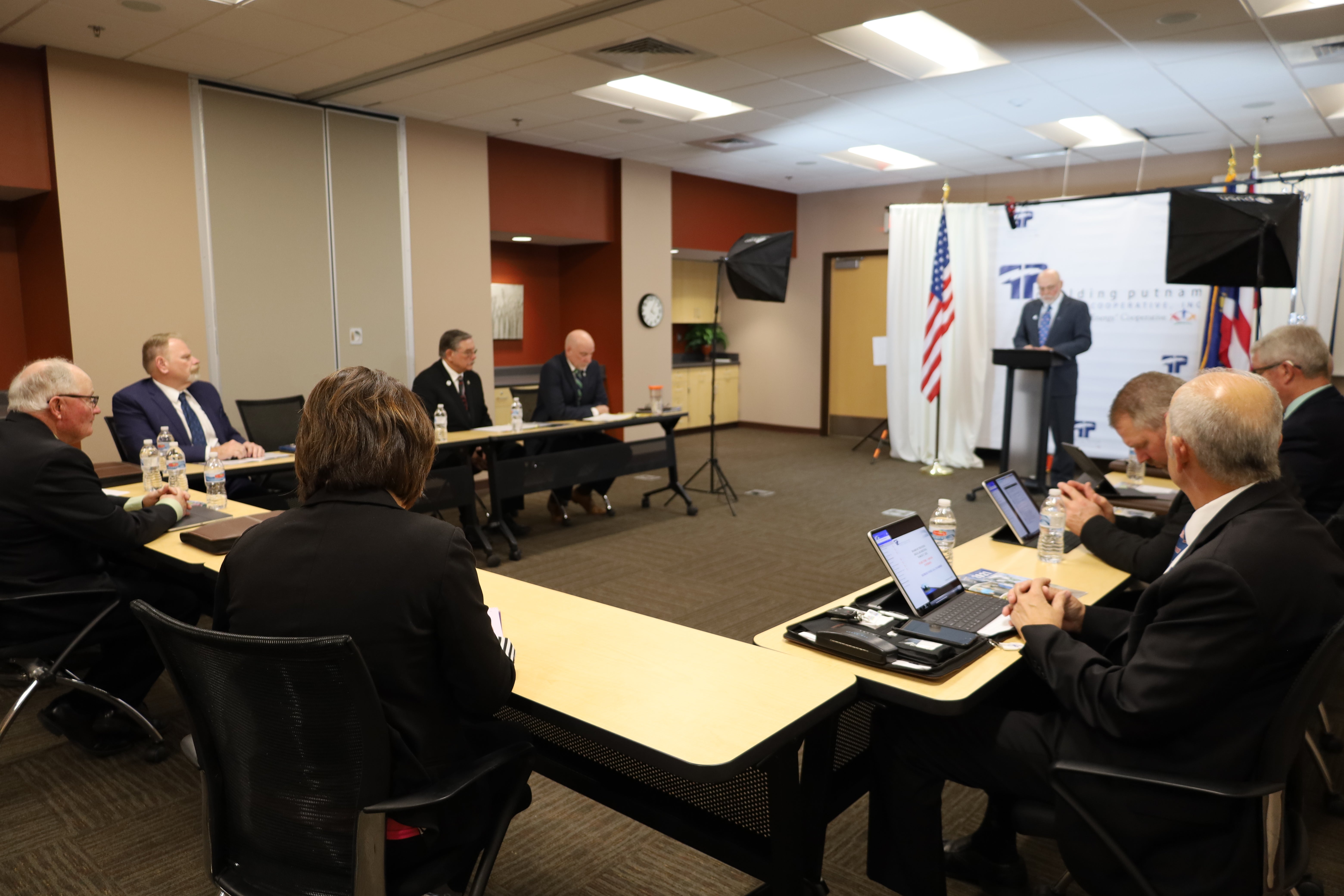 The board listens to Dr. Ronald Black speak at the annual meeting