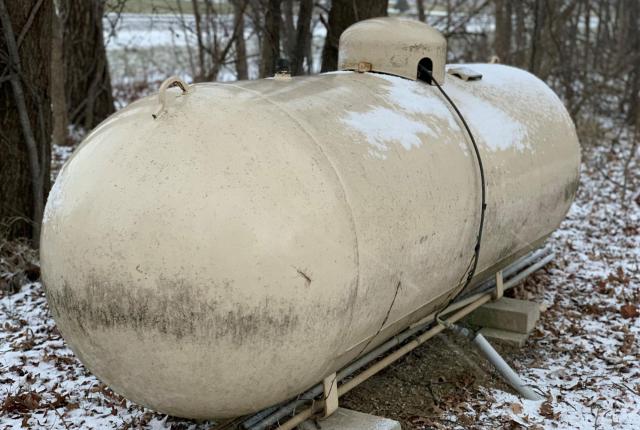 propane tank in winter snow